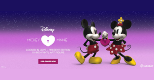 A Mickey Mouse and Minnie Mouse vinyl figure, featuring the pair in their classic outfits