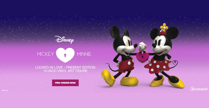 A Mickey Mouse and Minnie Mouse vinyl figure, featuring the pair in their classic outfits A Mickey Mouse and Minnie Mouse vinyl figure, featuring the pair in their classic outfits