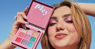 Peyton List holding an eyeshadow pallet from Pley Beauty