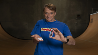 Tony Hawk showcasing his fingerboard collaboration with Mattel.