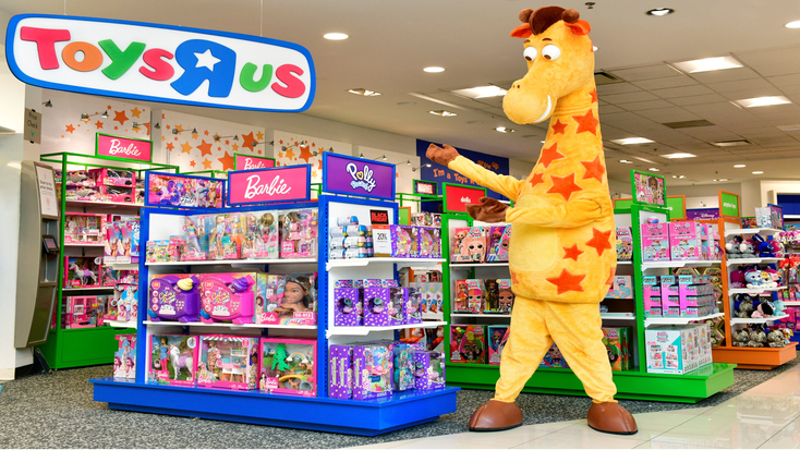 Geoffrey the Giraffe at a Toys"R"Us store.