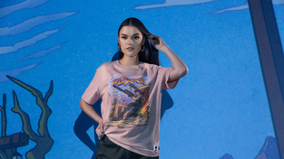 Model wearing Team Liquid "Fortnite" apparel.
