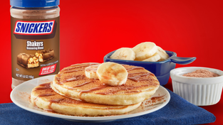 Banana pancakes with Snickers Shakers on top.