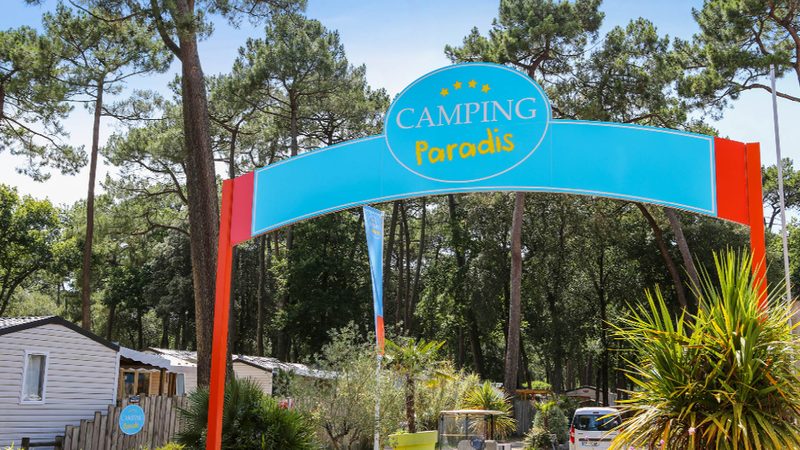 A “Camping Paradis” entrance. A “Camping Paradis” entrance.