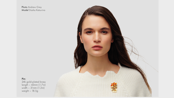 Model wearing the Kalyna pin. Model wearing the Kalyna pin.