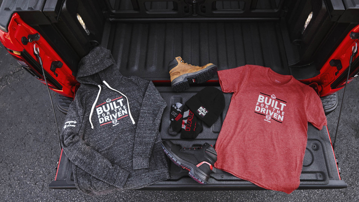 Hoodie, boots, T-shirt and beanie from the collection.