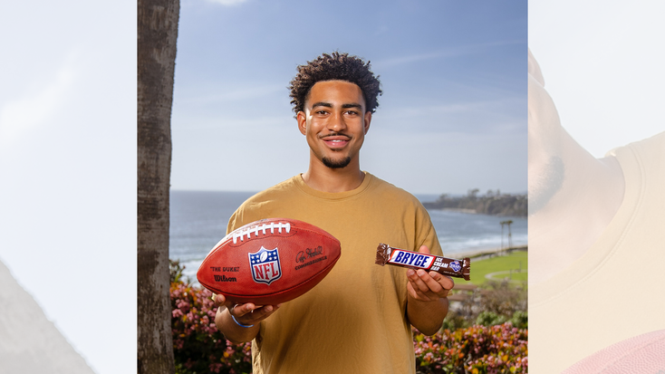 Bryce Young with the Snickers Bryce Cream Bar.