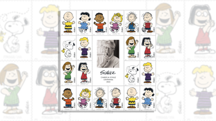 The entire Peanuts crew, including Snoopy, Woodstock, Charlie Brown and more, with illustrator Charles Schulz in the center.