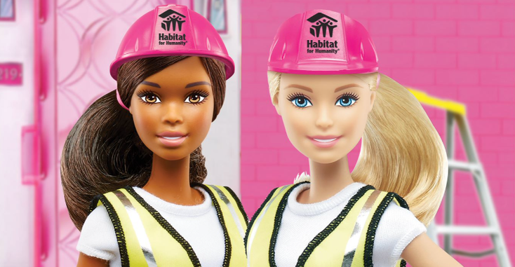Two Barbie dolls wearing Habitat for Humanity hard hats.