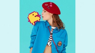 Model wearing beret and top from the Tamagotchi in Paris collection.
