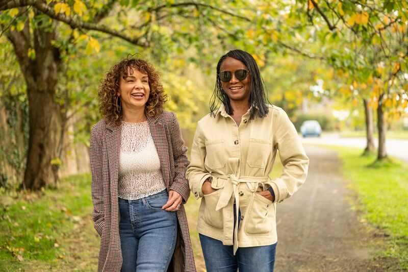 friends-walking-through-park.jpg