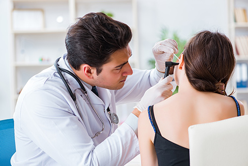 doctor-checking-patients-ear-500.jpg