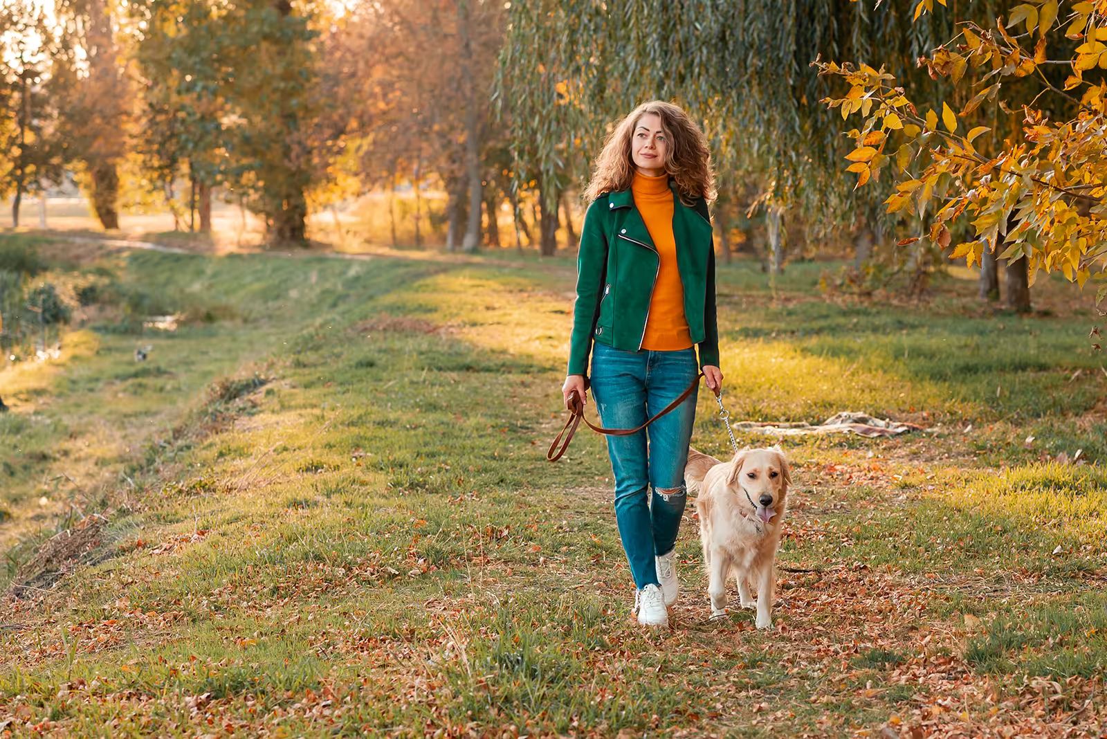 woman walking dog.avif