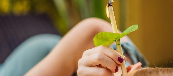 bigstock-ear-candling-being-carried-out-320857873.jpg