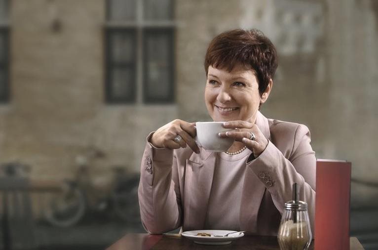 woman-with-hearing-loss-drinking-coffee.jpg