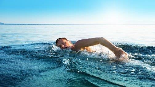 bigstock-young-man-swimming-in-oceans-w-12752129_2504283 (1).jpg