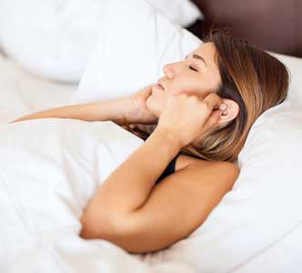 bigstock-woman-wearing-earplugs-in-bed-145366796-332x300.jpg