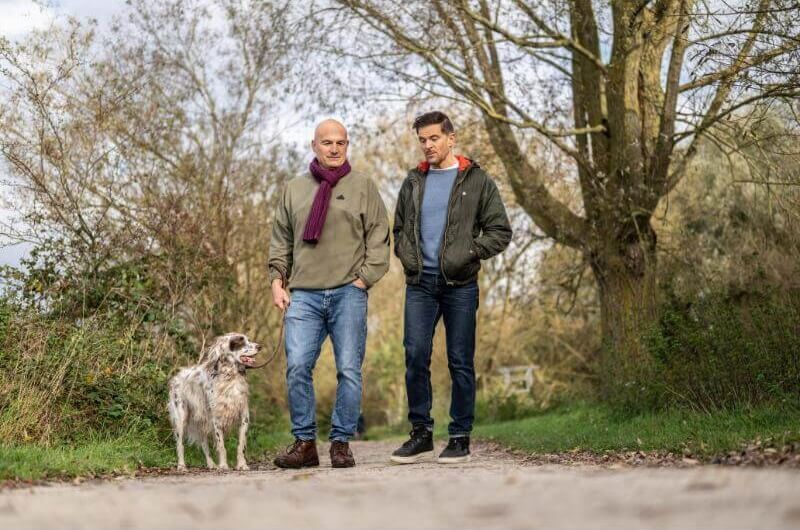 men-waking-through-woods.jpg