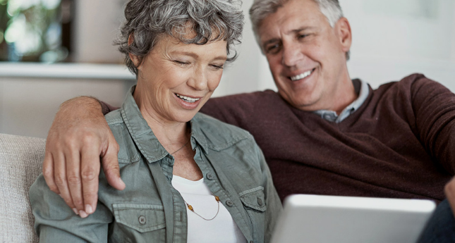 couple-on-couch-laptop.png