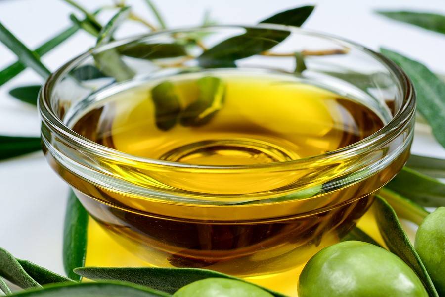 olive-oil-glass-transparent-b-335223646.jpg