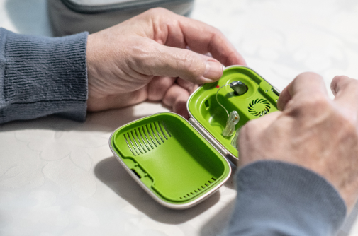 Green-case-hearing-aids.jpg