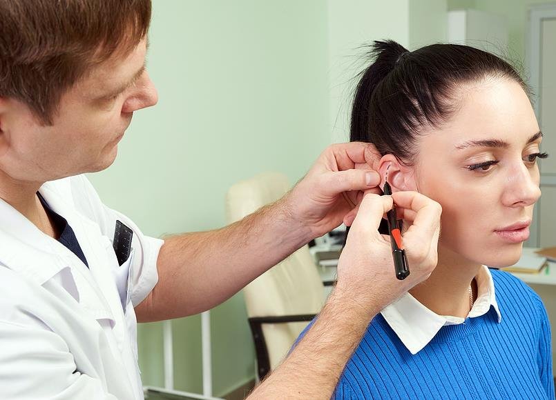 bigstock-plastic-surgeon-examines-ear-o-3536891990 (1).jpg