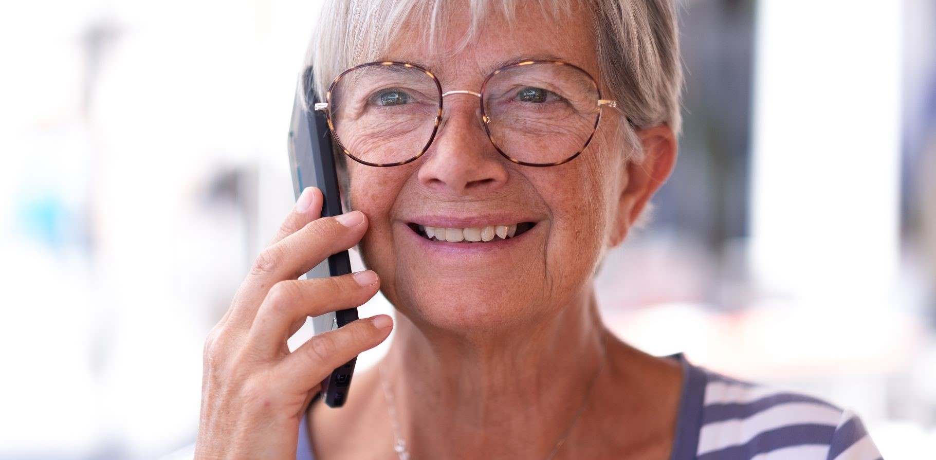 attractive-elderly-woman-telephone.jpg