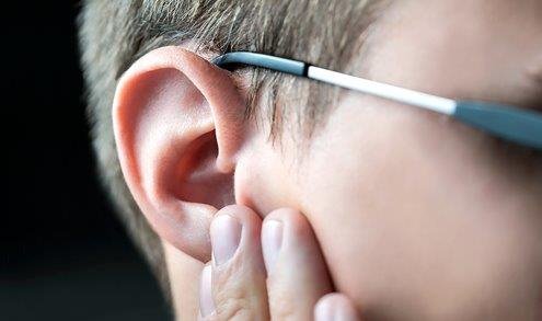 man-holding-ear.jpg