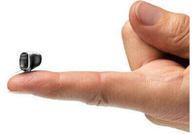 inivisible-hearing-aid-on-finger.jpg