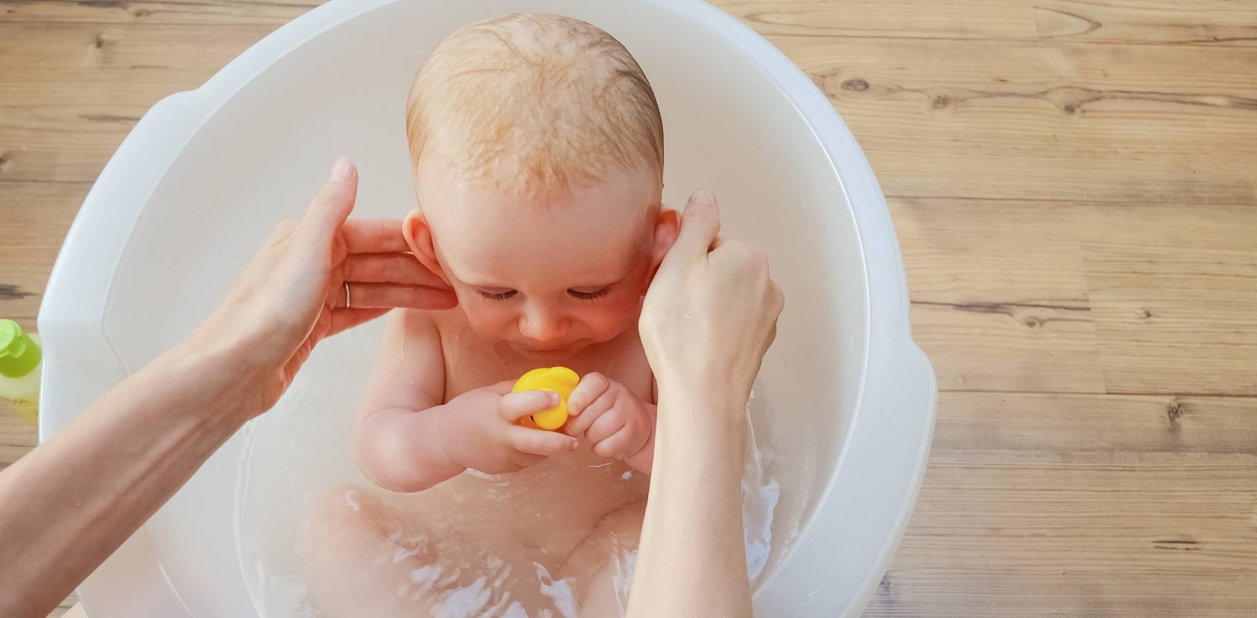 desktop banner_1821x896_Mom-Bathing-Baby-375396841.jpg