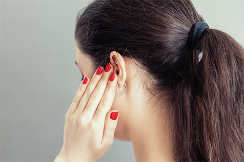 woman-touch-her-ear.jpg