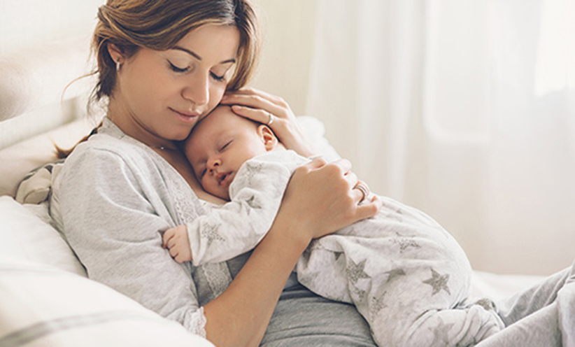 loving-mom-carying-of-her-newb-500.jpg