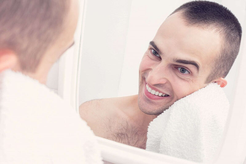 man-cleaning-his-ear.jpg
