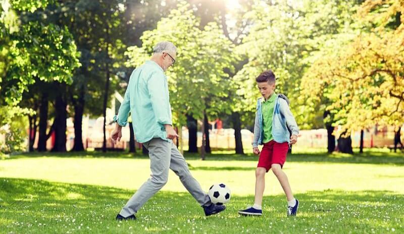 grandad-and-kids-paying-football.jpg