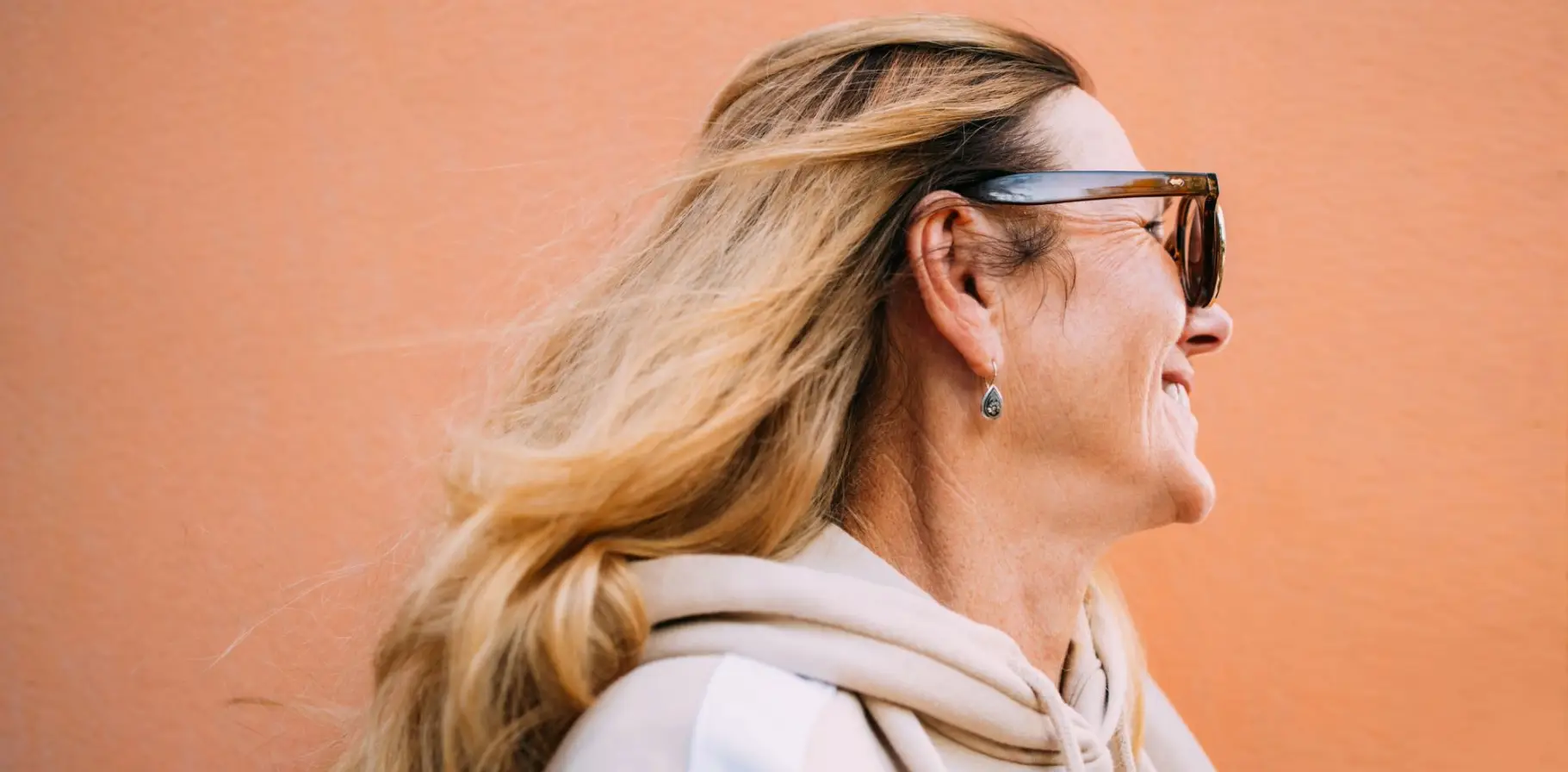 Desktop banner 1821x896_AN-24_Brand_50sWomanShadesSideView_Stocksy_3458869.webp