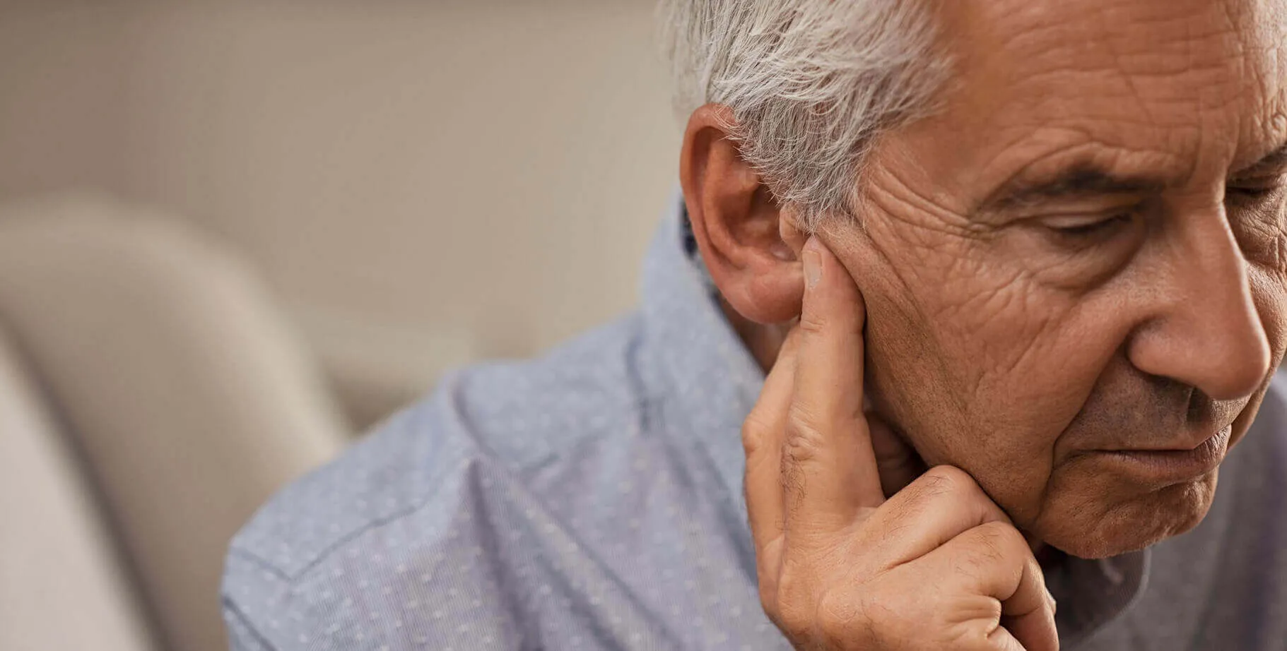 senior-man-with-earache-desktop-banner.jpg
