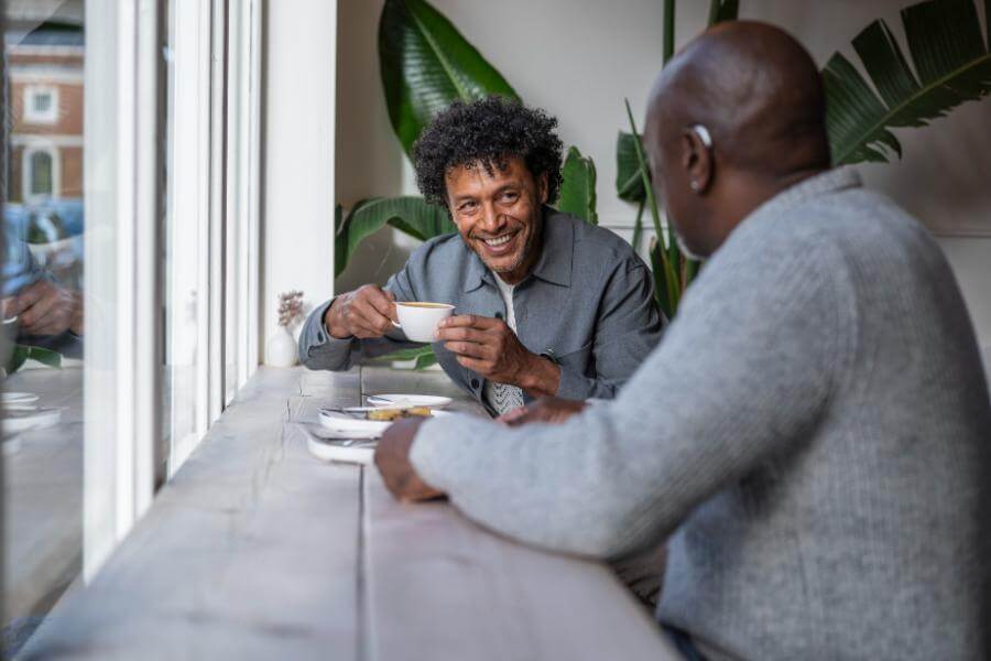 man-drinking-coffee-in-cafe.jpg