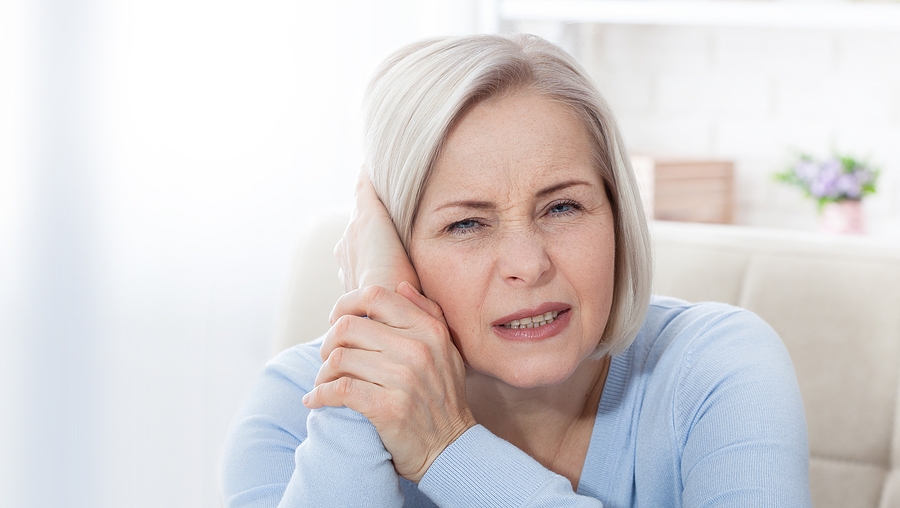 bigstock-tinnitus-closeup-up-side-prof-350634044.jpg