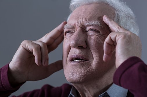 bigstock-man-holding-his-temples-91551740_3.jpg