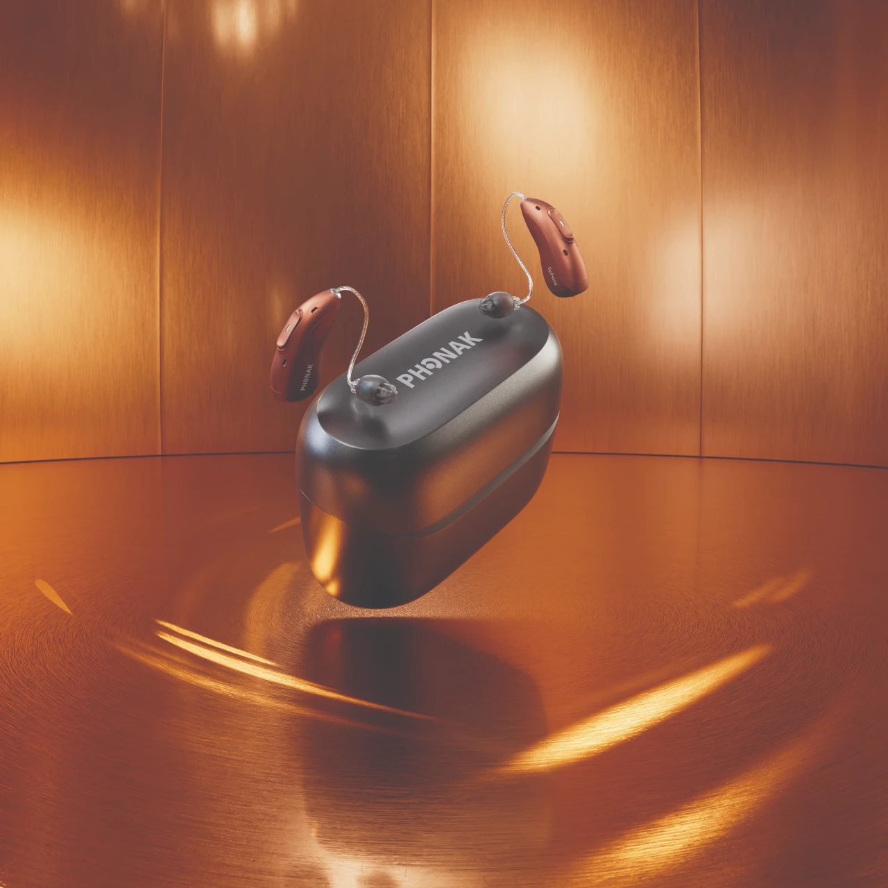 PH_Pic_AudeoE-CustomEarpieces-ChargerGo.webp