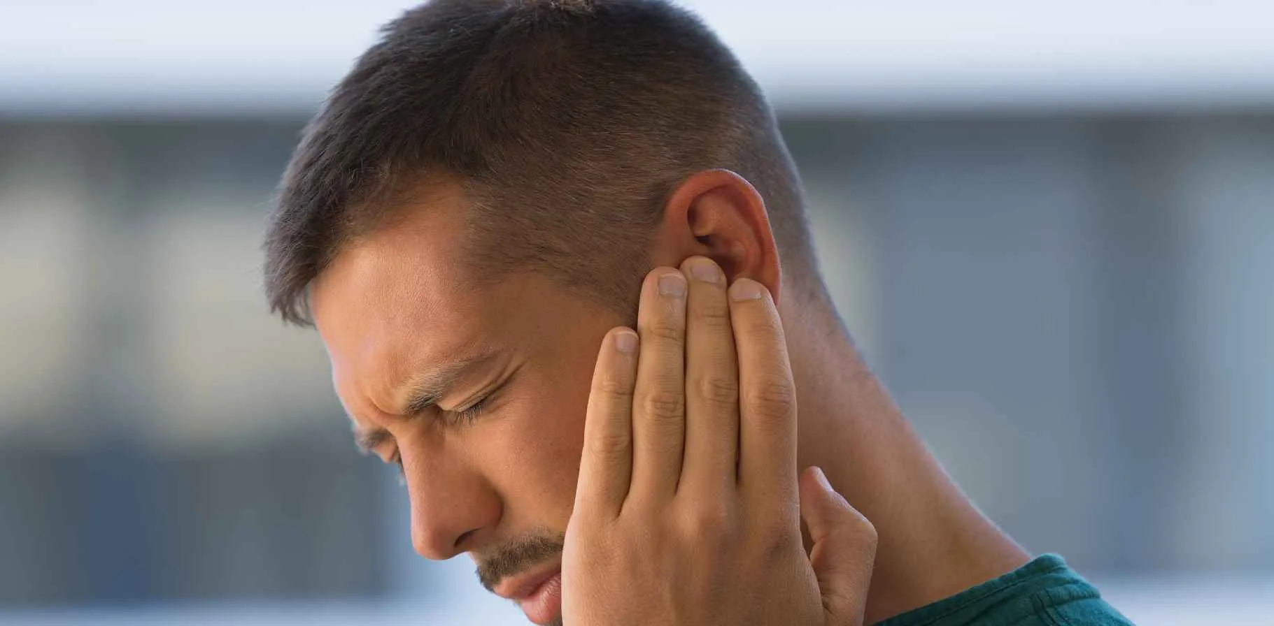 desktop banner 1821x896-Young-Man-With-Earache-Otitis-437264858.jpg