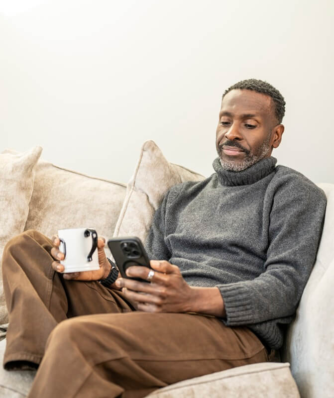man-sitting-on-sofa-mobile-banner.jpg
