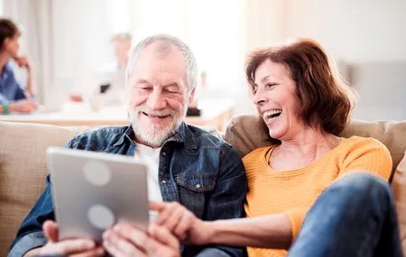 couple-on-couch-with-tablet_1524564302.jpg