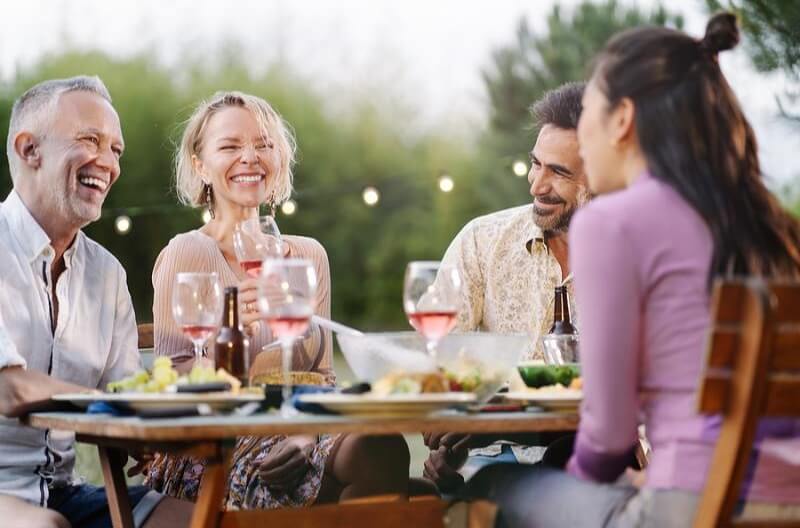 family-having-dinner-outside.jpg