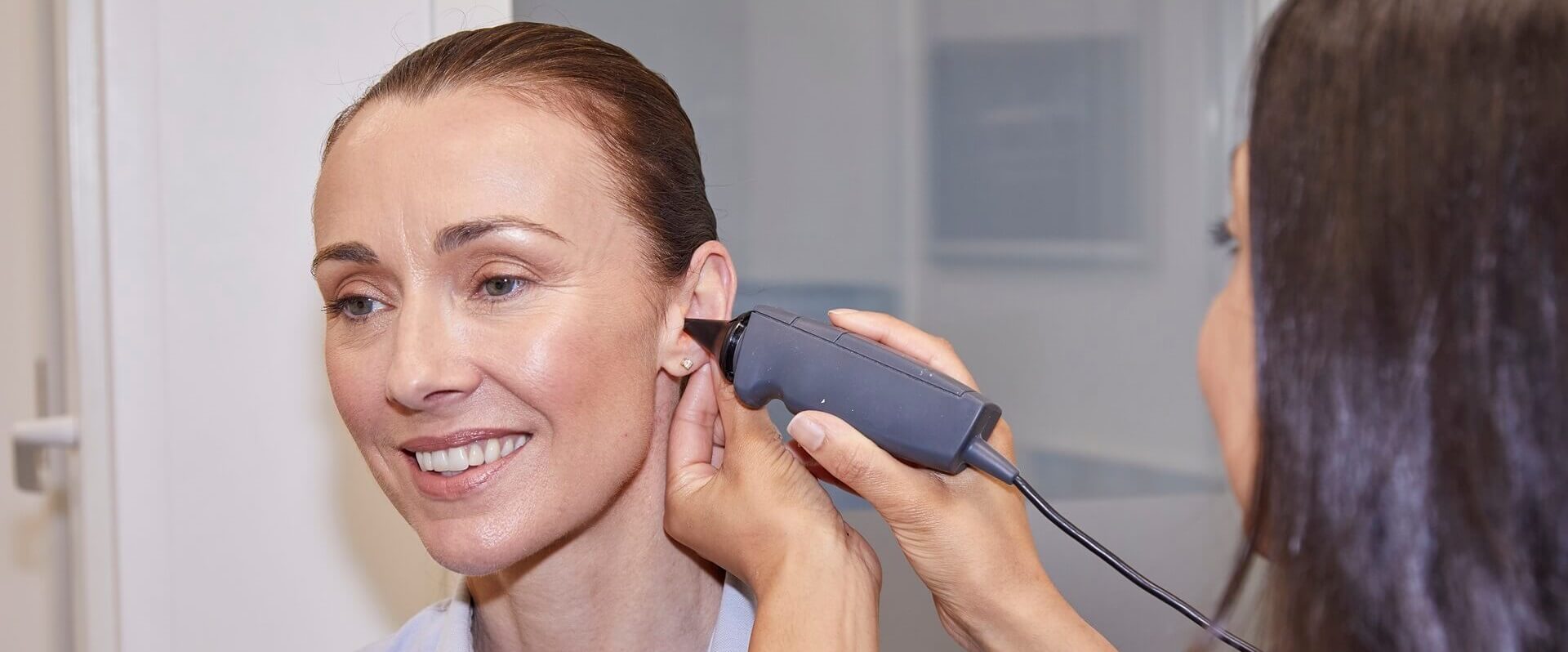 women-having-ears-checked-desktop-banner.jpg