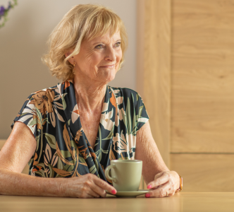 elderly-woman-having-tea.png