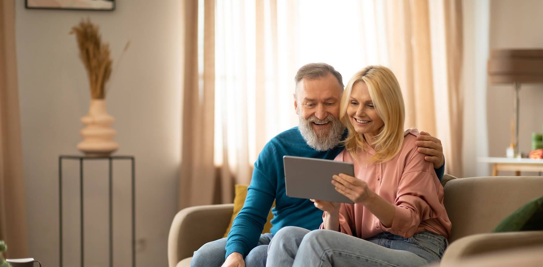 couple-on-ipad-desktop-banner.jpg
