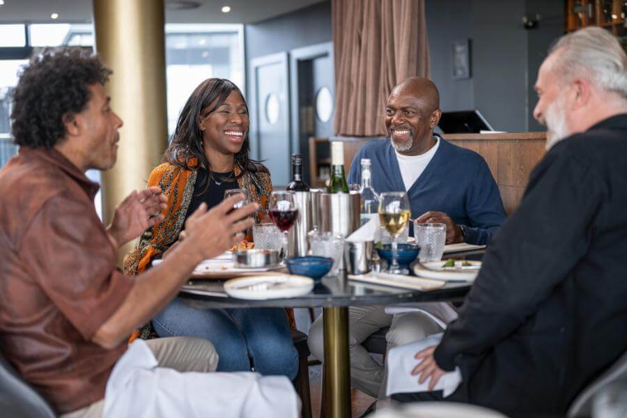 friends-smiling-at-restaurant.jpg
