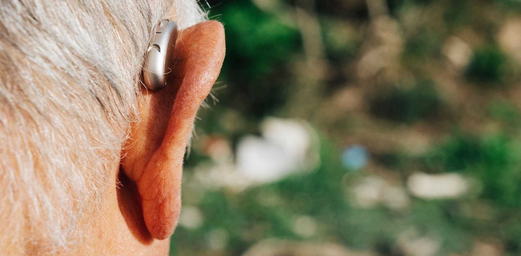 closeup-man-hearing-aid.jpg