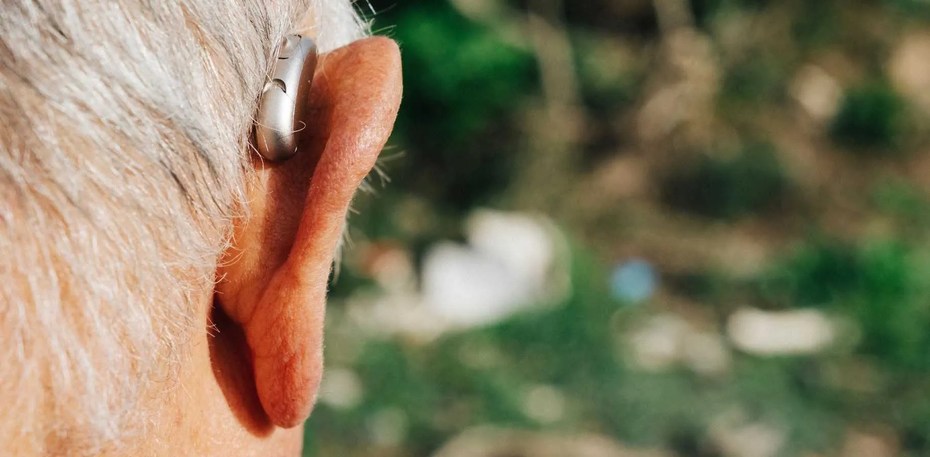 closeup-man-hearing-aid.jpg
